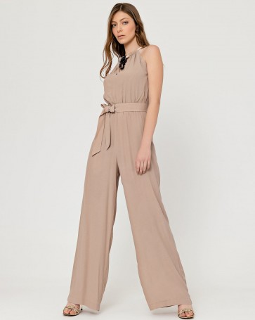 Access jumpsuit with jewelry on the neck Beige