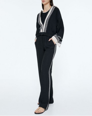 Access pleated trousers with fringe on the side Black