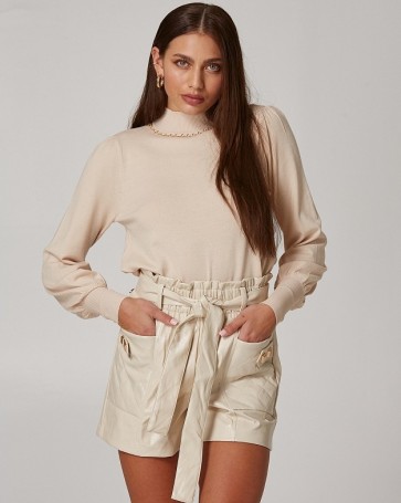 Lynne knitted blouse with chain embellished lapel in Cream